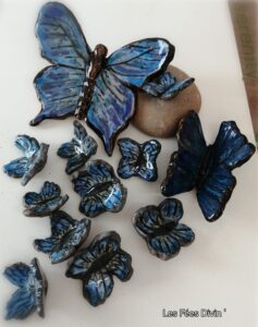 envol de papillons bleus